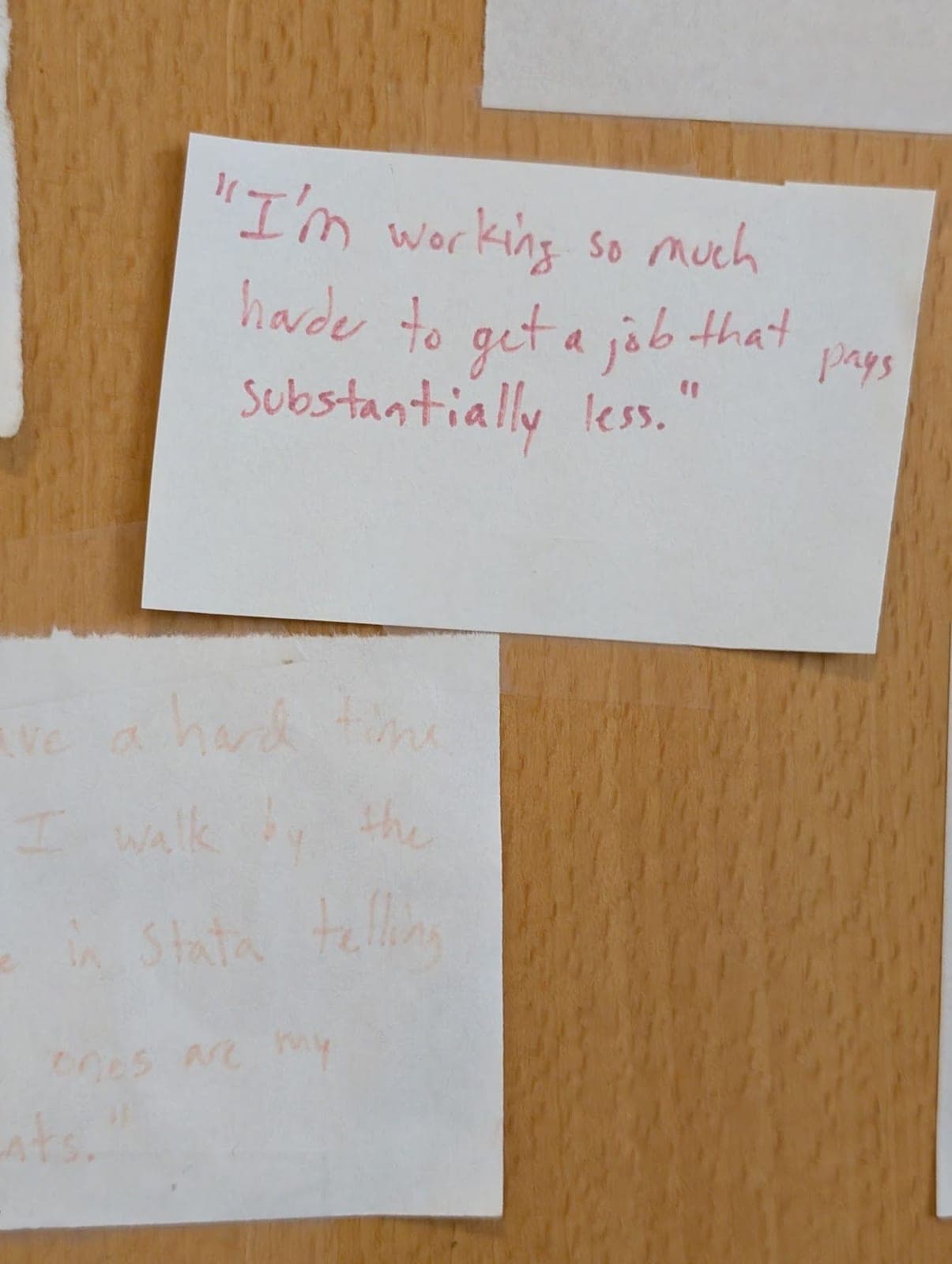 A handwritten note taped to the door.