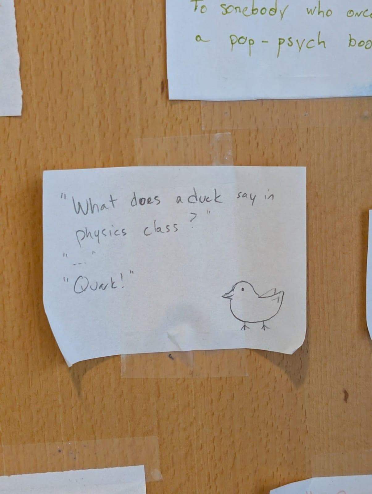 A handwritten joke on the door, with a little duck drawn next to it.