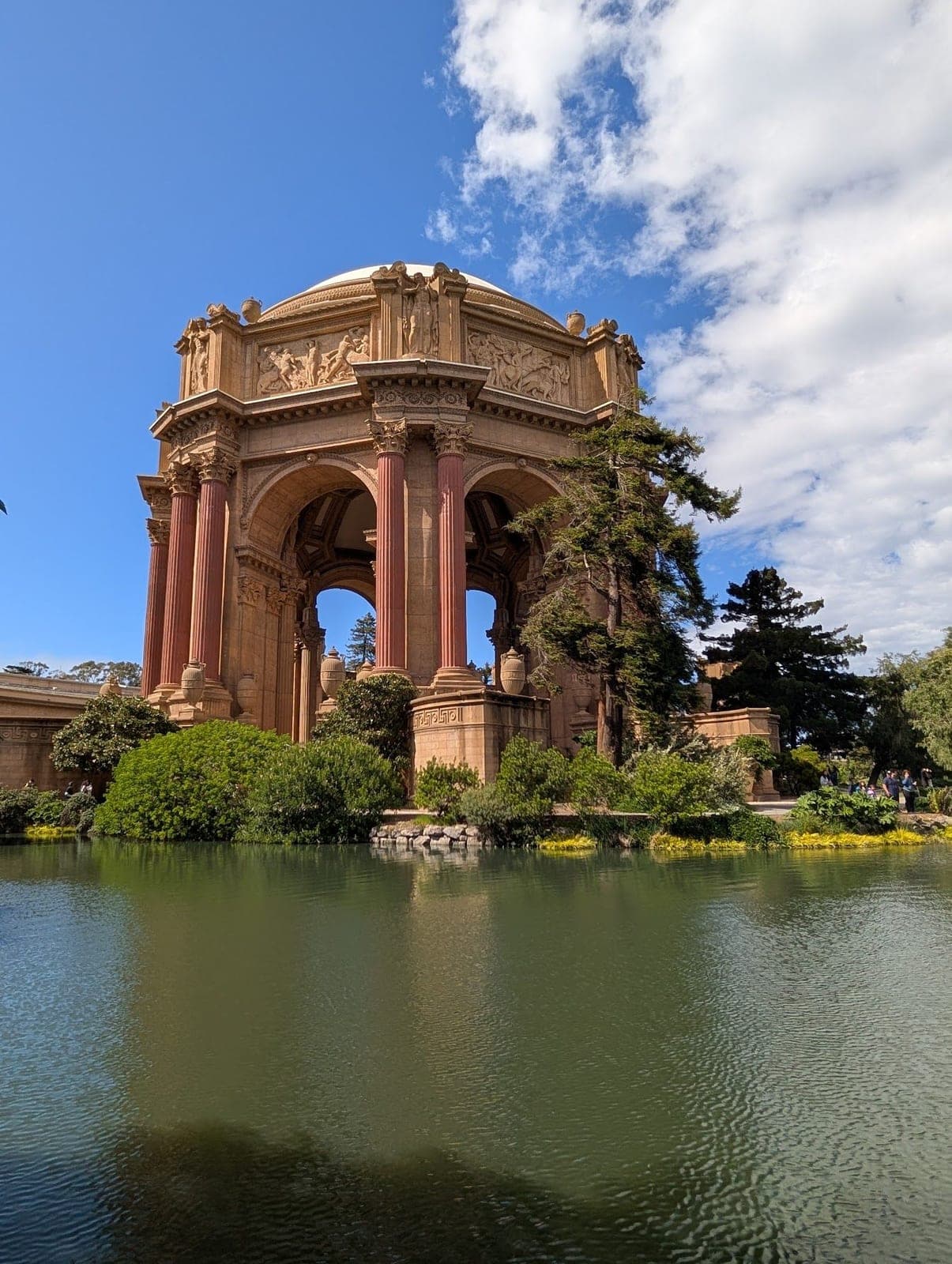 The domed rotunda of the Palace of Fine Arts reflected in its lagoon.
