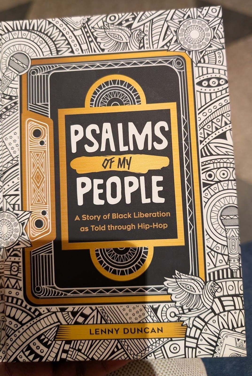 The cover of Psalms of My People by Lenny Duncan: a story of Black liberation told through hip-hop, patterned in black, white and gold.